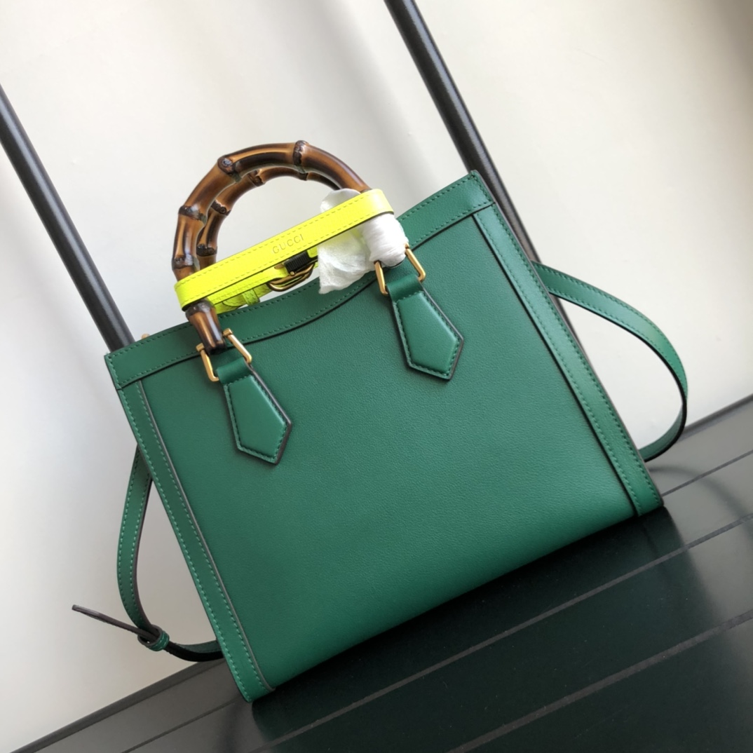 G*u*i diana top handbags