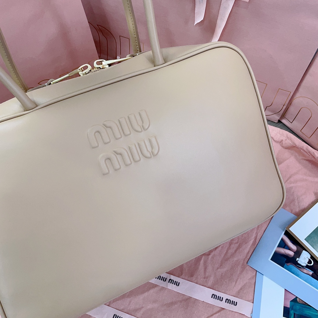 M*um*u leather top handbag-34x23x12cm